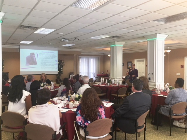 Donna True, LCSW, Program Services Coordinator for the Alzheimer's Association Southeast Florida Chapter, addresses the group at Harbor Place in Port St. Lucie.