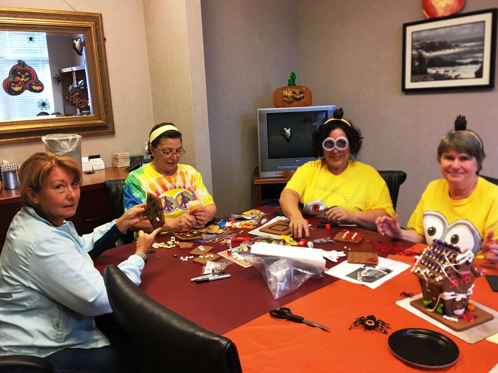 The Estate Administration Department at work on their haunted house. (L-R) Paralegals Janet Suarez, Ana Stalker, Norma Cruz and Gail Brown 